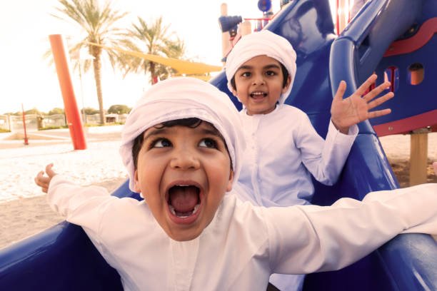 group of middle eastern kids playing and having fun outdoors